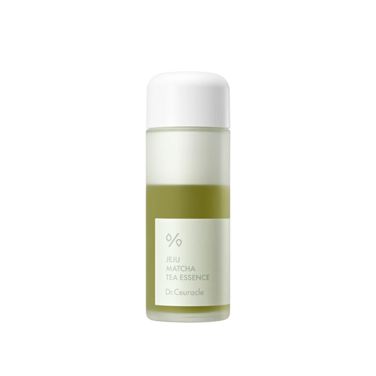 DR. CEURACLE Jeju Matcha Tea Essence is a dual-layer cream essence that brightens, refines, and deeply hydrates the skin. Formulated with 71% Green Tea Water, exclusive Matcha Extract, and gentle exfoliants (PHA + LHA), it smooths texture, tightens pores, and removes impurities. Enriched with a 9-Peptide complex, it boosts elasticity and softens the look of fine lines, while its fast-absorbing, moisture-locking formula leaves skin calm, radiant, and refreshed.