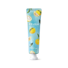 Load image into Gallery viewer, FRUDIA My Orchard Citron Hand Cream is a lightweight, citrus-scented moisturizer that softens and hydrates dry hands. Enriched with Shea Butter, Squalane, and Citrus Extracts, it nourishes the skin while providing a refreshing boost of moisture. With a silky texture and quick absorption, it leaves hands smooth, non-greasy, and delicately scented—perfect for daily use.