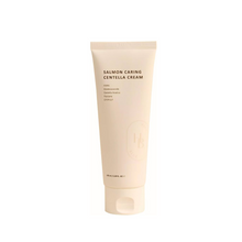 Load image into Gallery viewer, HEVEBLUE Salmon Caring Centella Cream is a soothing and nourishing moisturizer that strengthens and hydrates sensitive skin. Infused with Centella Asiatica Leaf Water, Salmon Egg Extract, and Hyaluronic Acid, it calms irritation, supports skin recovery, and locks in moisture. Enriched with Avocado Extract, Panthenol, and Madecassoside, this rich yet lightweight cream leaves the skin soft, smooth, and resilient.