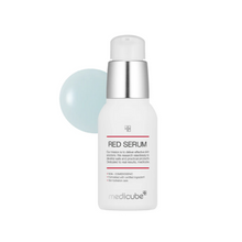 Load image into Gallery viewer, MEDICUBE Red Serum 2.0 is an advanced skin treatment designed to tackle acne and soothe inflammation. Formulated with Niacinamide, Salicylic Acid, and Tea Tree Leaf Oil, this serum effectively reduces blemishes and purifies pores. Enriched with Centella Asiatica and Ceramide NP, it also strengthens the skin barrier and hydrates, promoting a clearer and healthier complexion.