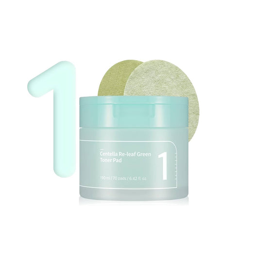 NUMBUZIN No.1 Centella Re-Leaf Green Toner Pad is a soothing and refreshing toner pad designed to calm sensitive and irritated skin. Infused with Centella Asiatica, Licorice Root, and Houttuynia Cordata Extracts, it helps reduce redness and strengthen the skin barrier. Enriched with Panthenol, Allantoin, and Tea Tree Oil, each pad delivers gentle hydration and relief, leaving your skin soft, balanced, and comfortably smooth. Perfect for daily use to refresh and tone the skin.