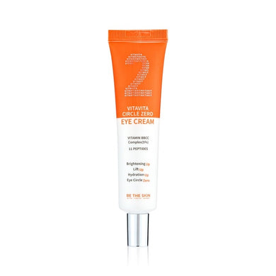 BE THE SKIN Vitavita Circle Zero Eye Cream is a nourishing eye cream designed to brighten and revitalize the delicate skin around the eyes. Infused with Niacinamide, Vitamin C derivatives, and a blend of peptides, this cream helps to reduce the appearance of dark circles, fine lines, and puffiness. The addition of Hydrolyzed Collagen and Elastin enhances skin elasticity and firmness, while Panthenol and Betaine provide deep hydration. Perfect for daily use, it leaves the eye area looking refreshed, smooth, 