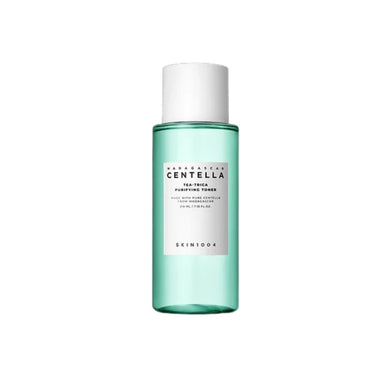 SKIN1004 Madagascar Centella Tea-Trica Purifying Toner is a refreshing and clarifying toner designed to soothe and balance the skin. It features 12% Tea Tree Leaf Water and 9.8% Centella Asiatica Extract to calm irritation and reduce redness while promoting a healthy skin barrier. Infused with Salicylic Acid, it gently exfoliates and helps unclog pores, making it ideal for acne-prone and sensitive skin. With added Lavender Extract and Castanea Crenata Shell Extract, it nourishes and refreshes, leaving your 